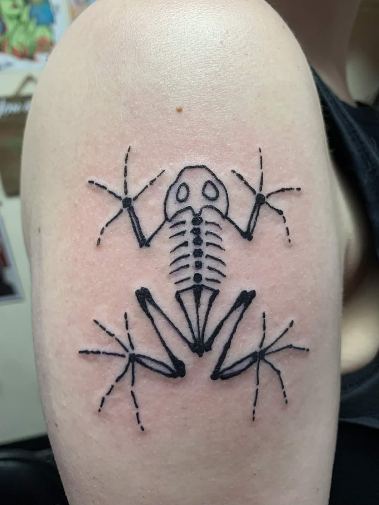 tattoo of a skeletal frog